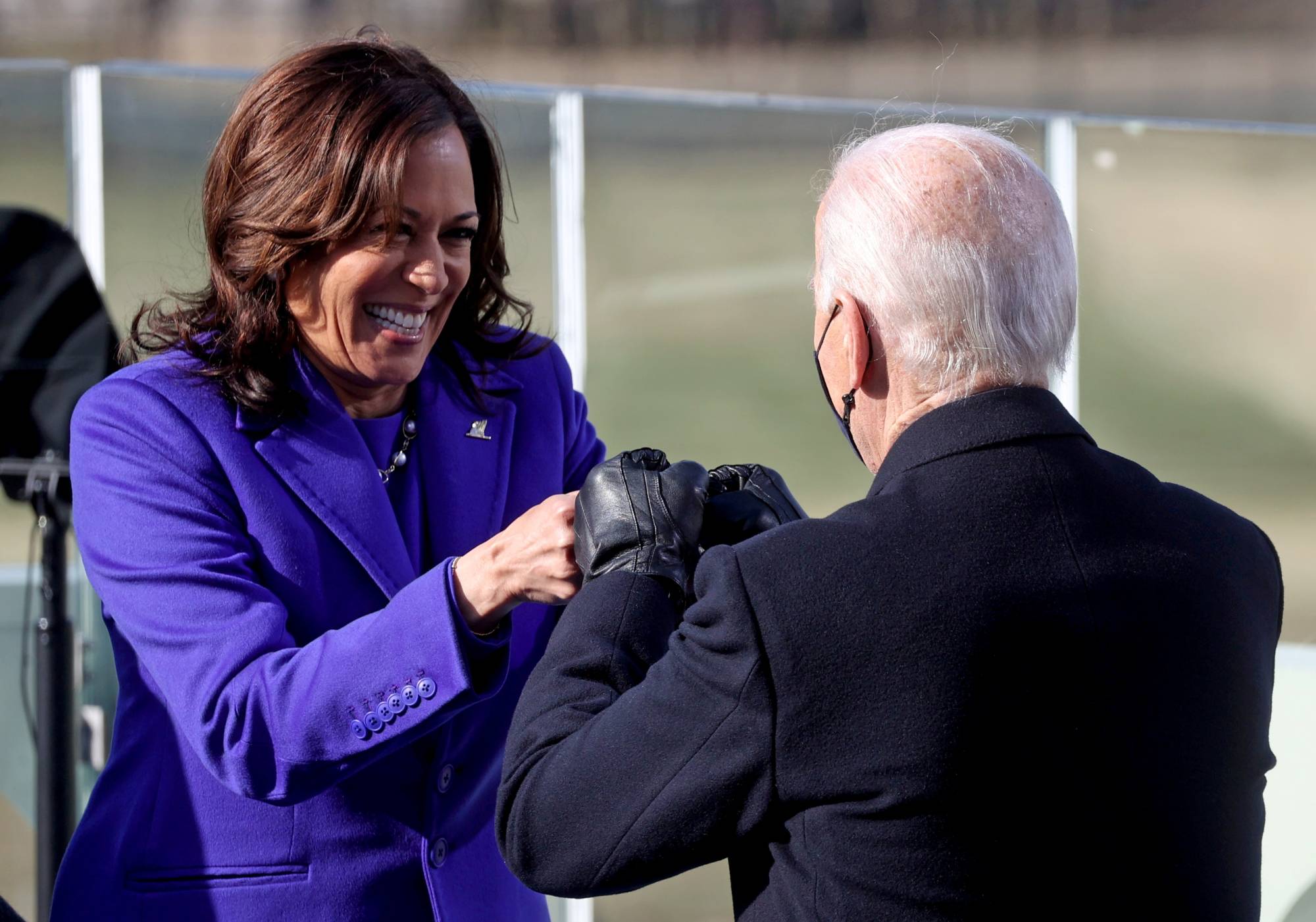 Kamala Harris bumps fists with Joe Biden after being sworn in as vice president of the United States during the inauguration on the West Front of the U.S. Capitol in Washington on Wednesday. | REUTERS