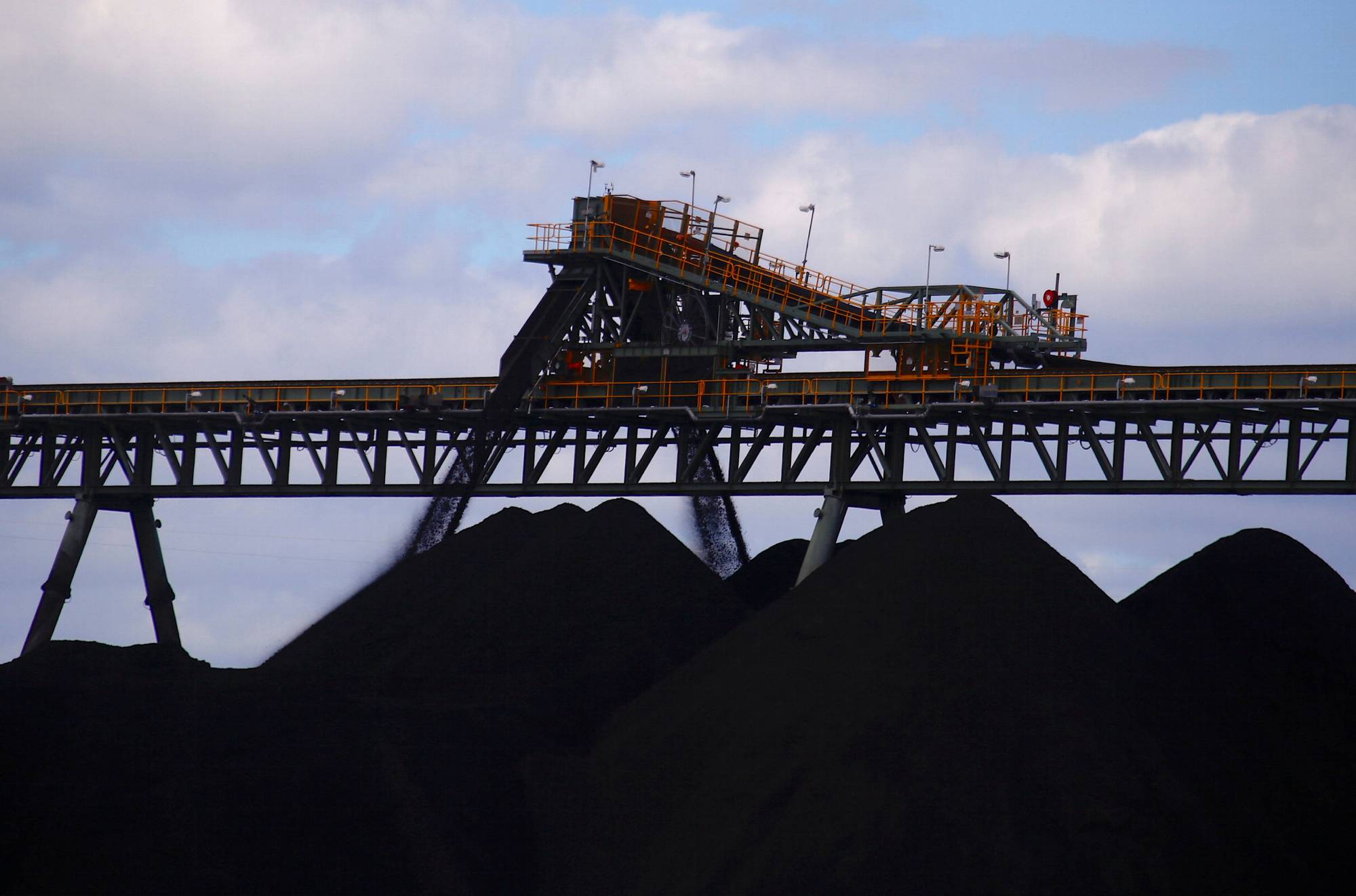 Coal is unloaded at the Ulan Coal mines near the New South Wales town of Mudgee in Australia in 2018. | Reuters 