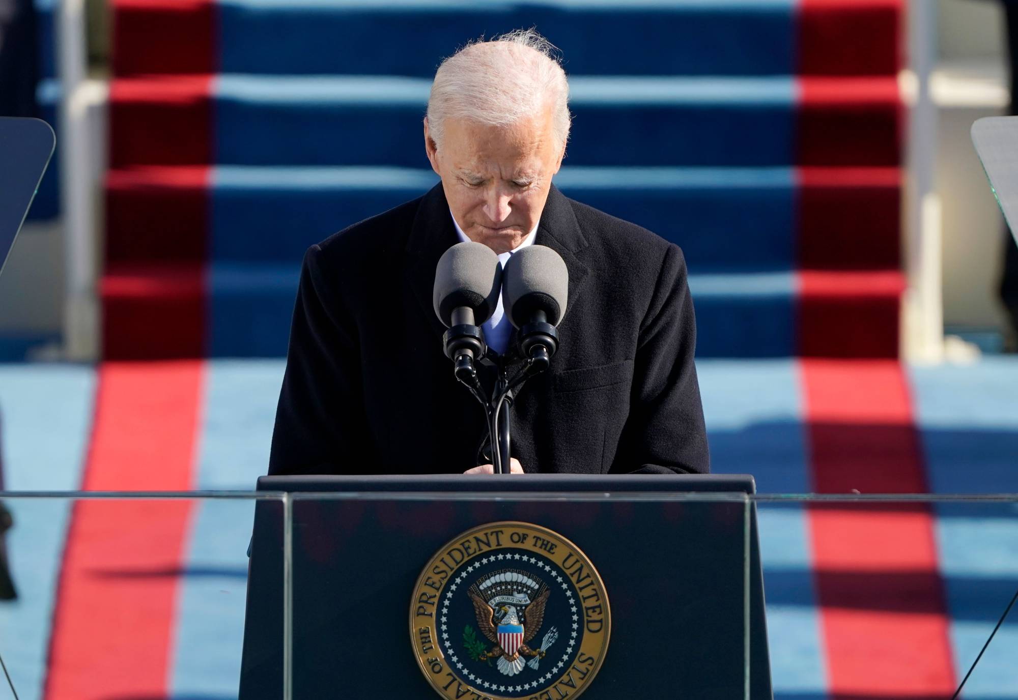 U.S. President Joe Biden delivers his inauguration speech Wednesday at the Capitol in Washington.  |  POOL / AFP-JIJI