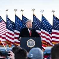 U.S. President Donald Trump speaks to supporters before boarding Air Force One for the last time at Joint Base Andrews in Maryland on Wednesday, hours before the presidential inauguration of Joe Biden.  | PETE MAROVICH / THE NEW YORK TIMES
