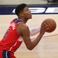 The Wizards\' Rui Hachimura shoots a free throw against the Bulls in Washington on Dec. 31. | USA TODAY / VIA REUTERS