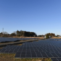 Solar panels installed by Fukushima Electric Power Co. in Tomioka, Fukushima Prefecture | BLOOMBERG
