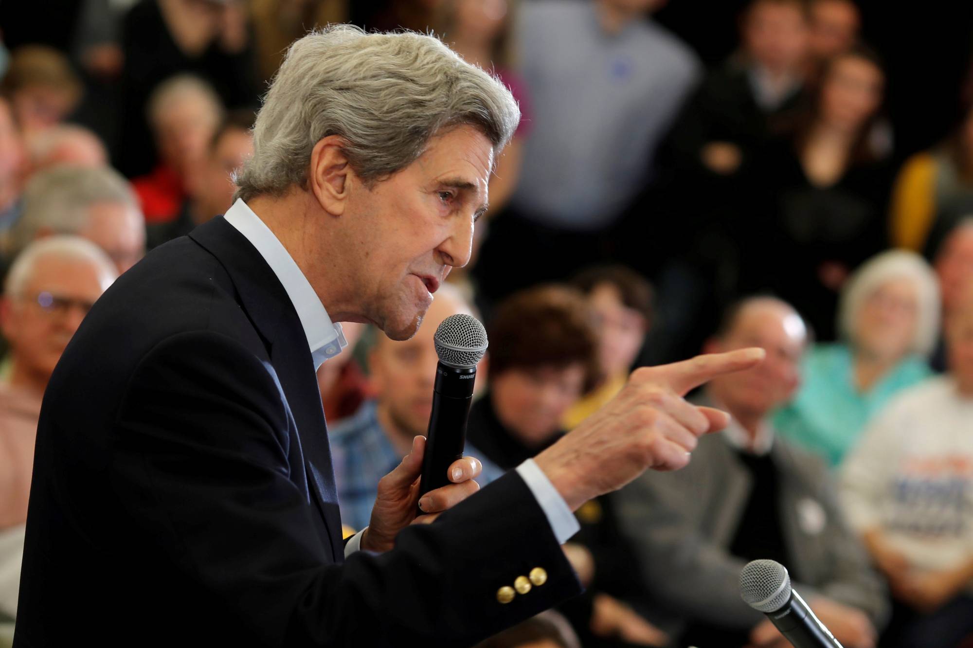 Former U.S. Secretary of State John Kerry speaks during a campaign event in support of Joe Biden in North Libery, Iowa, in February. Kerry is now a special climate envoy in the Biden administration.  | REUTERS 