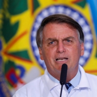 Brazil\'s President Jair Bolsonaro speaks during a ceremony at the Planalto Palace in Brasilia on Jan. 12. | REUTERS