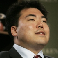 Colin Fan, SoftBank Vision Fund managing partner, is leaving his role at the fund, sources say. | BLOOMBERG