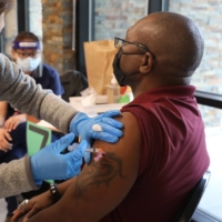 The Moderna COVID-19 vaccine is administered in Mountain View, California, on Friday. | JIM WILSON / THE NEW YORK TIMES