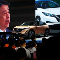 Nissan Chief Executive Officer Makoto Uchida speaks at a Nissan booth via video link during the presentation of the Ariya at the Beijing International Automotive Exhibition in Beijing in September 2020. | REUTERS