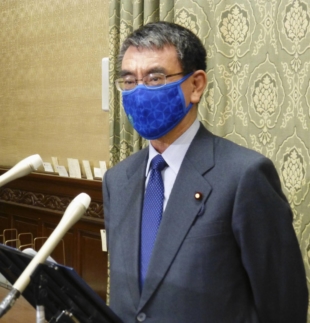 Taro Kono, minister in charge of civil service reform, says Japan has to make child care leave for men more common. | KYODO