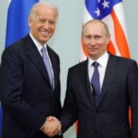 U.S. President Joe Biden and President Vladimir Putin of Russia, pictured in 2011, formally agreed to extend the last remaining nuclear arms treaty between their countries on Tuesday.  | POOL / VIA AFP-JIJI
