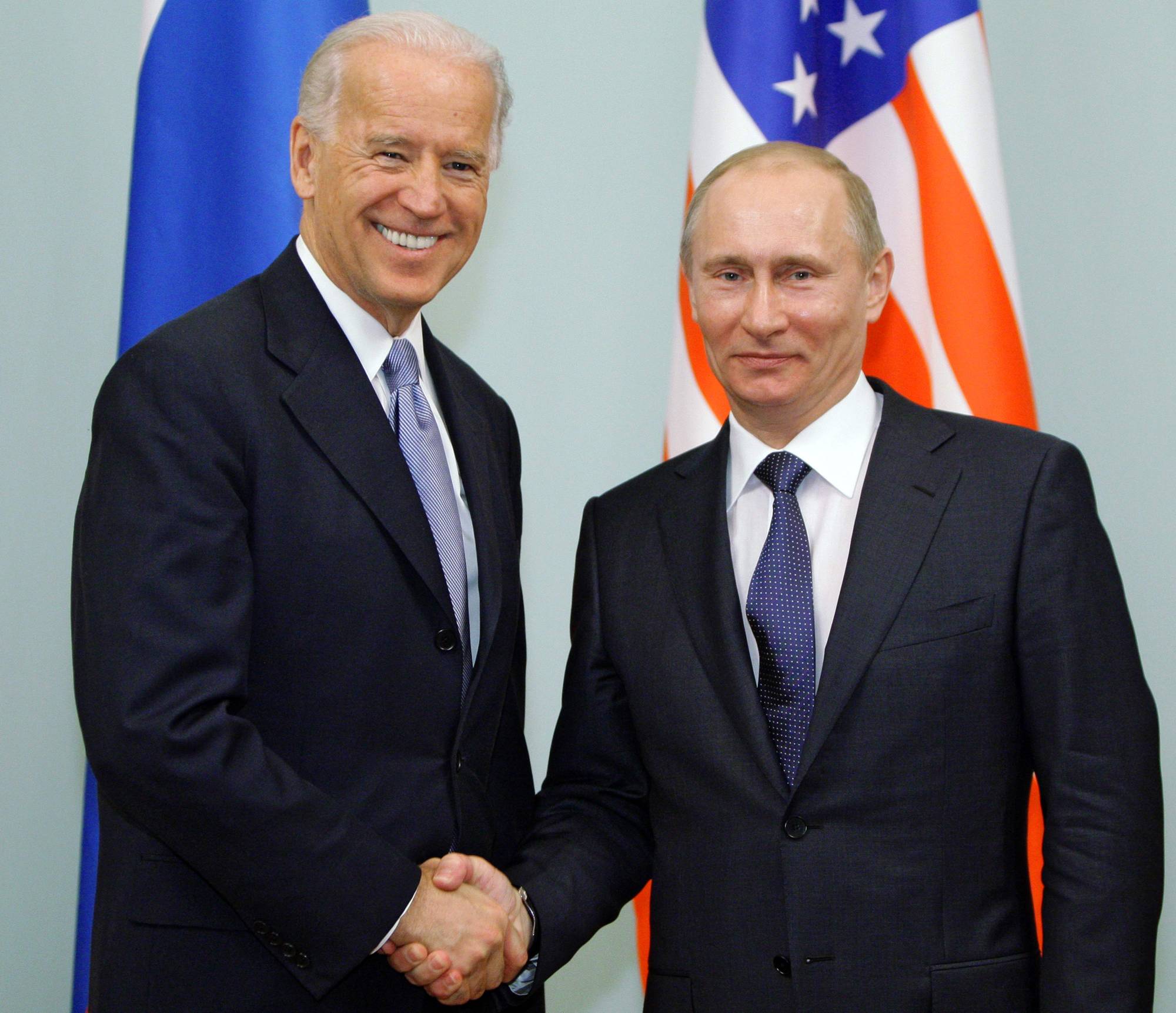 U.S. President Joe Biden and President Vladimir Putin of Russia, pictured in 2011, formally agreed to extend the last remaining nuclear arms treaty between their countries on Tuesday. | POOL / via AFP-JIJI