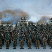 Chinese People\'s Liberation Army soldiers assemble during military training in Kashgar in China\'s northwestern China\'s Xinjiang region earlier this month. | AFP-JIJI