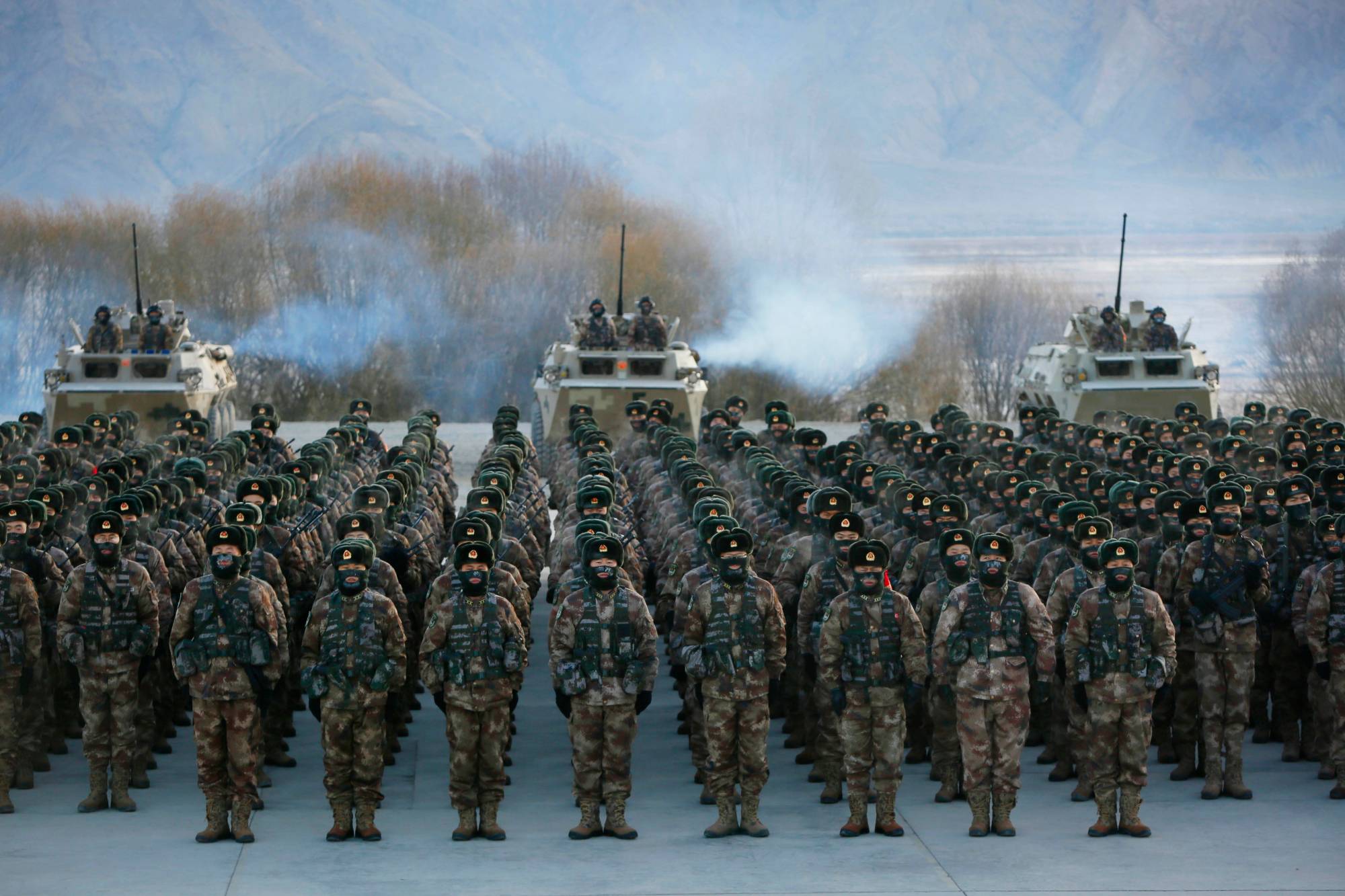 Chinese People's Liberation Army soldiers assemble during military training in Kashgar in China's northwestern China's Xinjiang region earlier this month. | AFP-JIJI