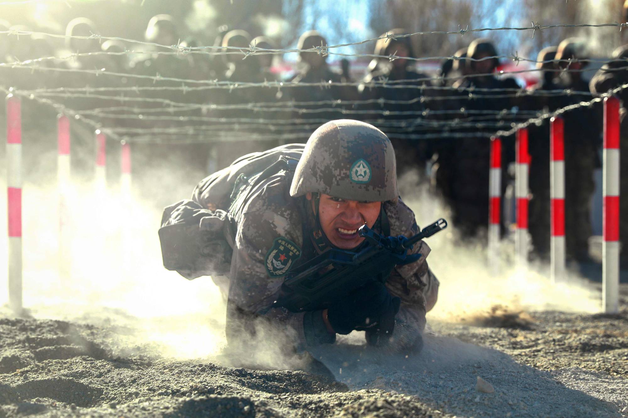 Chinese People's Liberation Army soldiers take part in training in Kashgar in China's northwestern China's Xinjiang region earlier this month. | AFP-JIJI