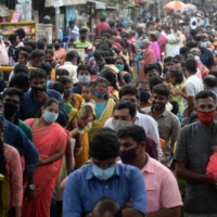 Hindu devotees wait in a queue to enter a Hindu temple on Jan. 1.  | AFP-JIJI