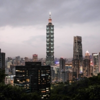 The Taipei 101 building and other buildings are illuminated at dusk in Taipei on Tuesday.  | BLOOMBERG