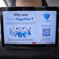 A QR code for the TraceTogether contact-tracing app in a taxi in Singapore on Jan. 15 | BLOOMBERG