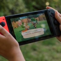 Nintendo Co. raised its annual earnings forecast for the second time on the back of a surge in sales of the Switch console. | BLOOMBERG