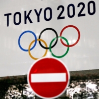 A banner for the upcoming Tokyo 2020 Games in Tokyo on March 23, 2020 | REUTERS
