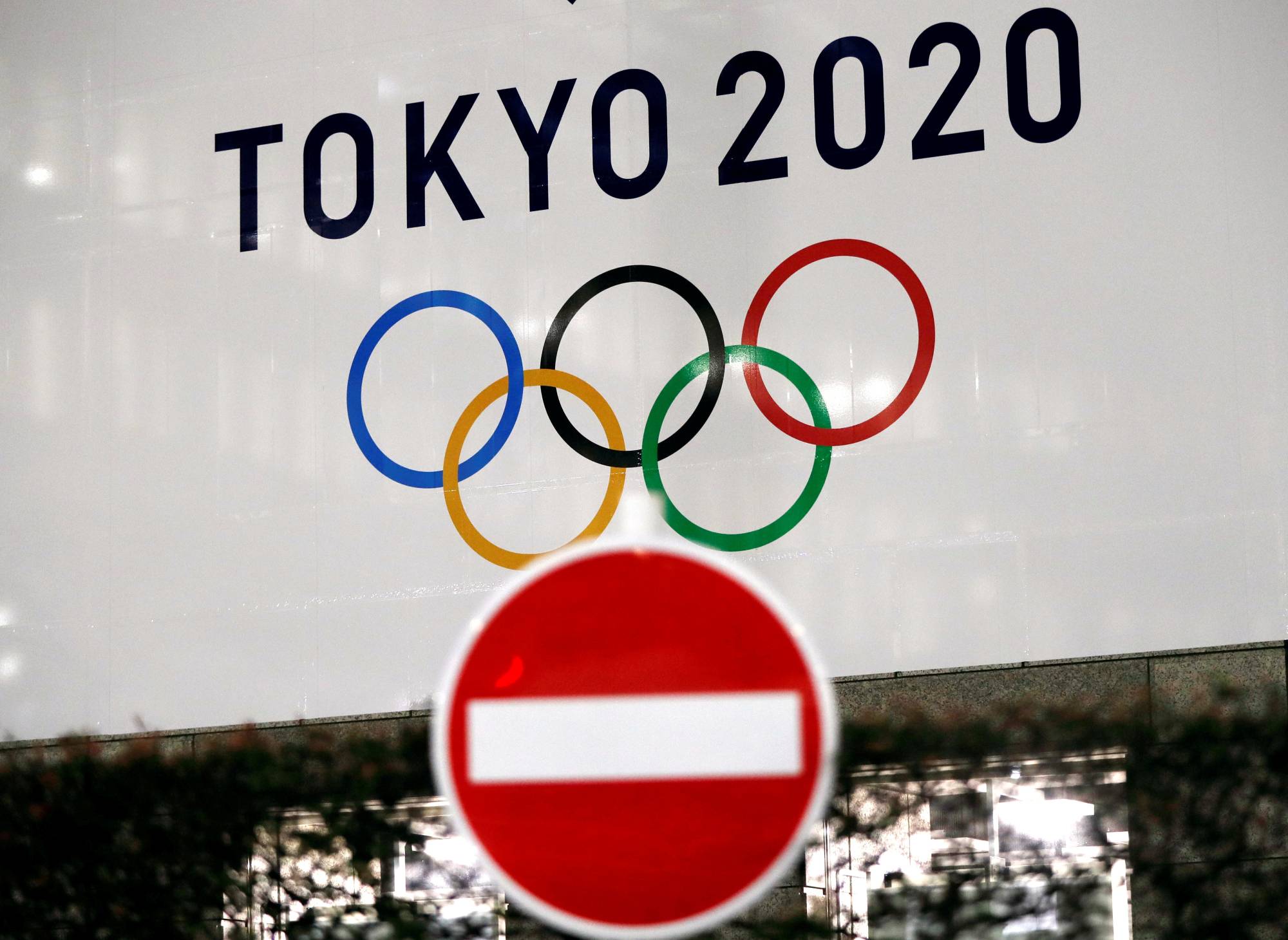 A banner for the upcoming Tokyo 2020 Games in Tokyo on March 23, 2020 | REUTERS