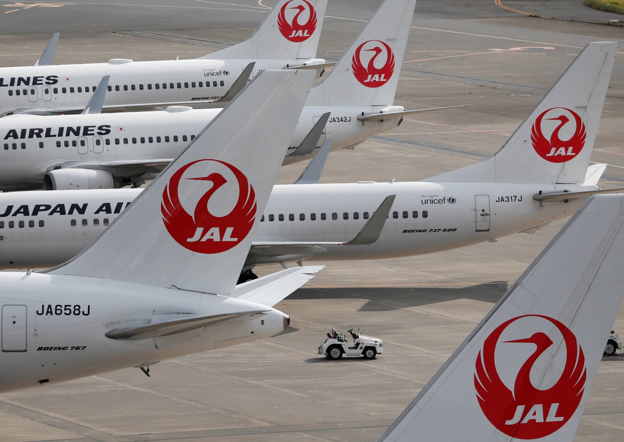 Airports around the world saw large numbers of planes parked up for much of 2020 as a result of the lack of travel during the year. | REUTERS