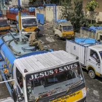 Water tank operators refill vehicles at a government-run station in Chennai on July 4, 2019, after all the city’s main reservoirs ran dry.  | BLOOMBERG 