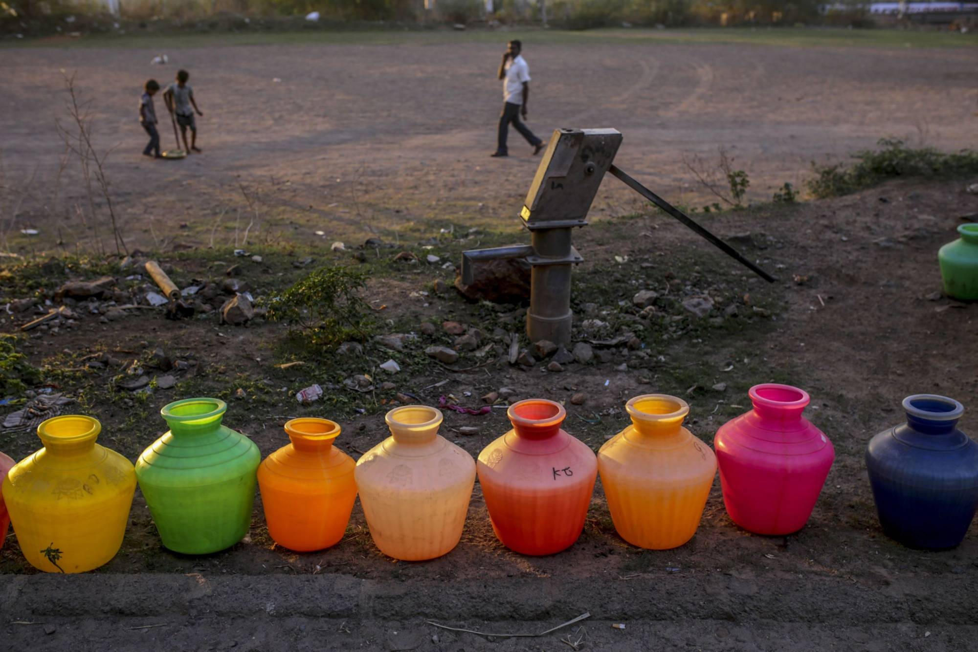 Empty water pots, left to be refilled by a water truck, line a residential street in Chennai, on July 4, 2019. | Bloomberg 