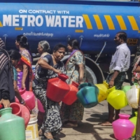 Residents fill pots from a water truck on July 4, 2019, when Chennai became one of the first major cities in the world to run dry.  | BLOOMBERG 