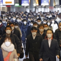 Tokyo reported 734 new COVID-19 cases on Thursday. | KYODO