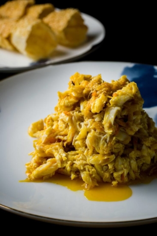 This dish is poppin’: Rich, sauteed crab meat comes served with a sesame-crusted popin cracker. | COURTESY OF XIE WANG FU 