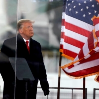 U.S. President Donald Trump looks on at the end of his speech during a rally to contest the certification of the 2020 U.S. presidential election results by Congress in Washington on Jan. 6. | REUTERS