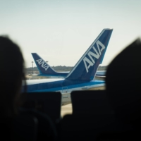 ANA Holdings Inc. plans to reduce its workforce in the aviation business by roughly 20% over the next five years through natural attrition to cut costs and cope with the COVID-19 crisis.  | BLOOMBERG 
