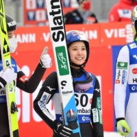 Japan\'s Sara Takanashi (center) celebrates with second place Nika Kriznar (left) of Slovenia and Norway\'s Silje Opseth after the FIS Women\'s Ski Jumping World Cup in Hinzenbach, Austria, on Sunday.  | BARBARA GINDL / APA / VIA AFP-JIJI