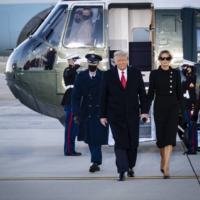 U.S. President Donald Trump, accompanied by first lady Melania Trump, on Jan. 20 | PETE MAROVICH / THE NEW YORK TIMES