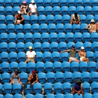 Attendance has been sparse in the opening days of the Australian Open after the appearance of a highly infectious coronavirus strain rattled Australian fans. | REUTERS