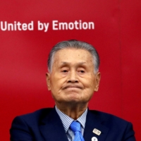 Yoshiro Mori, president of the Tokyo 2020 Olympic Games Organising Committee, holds a news conference in Tokyo in July last year after giving a presentation to the International Olympic Committee (IOC) about progress toward the rescheduled Summer Games. | REUTERS