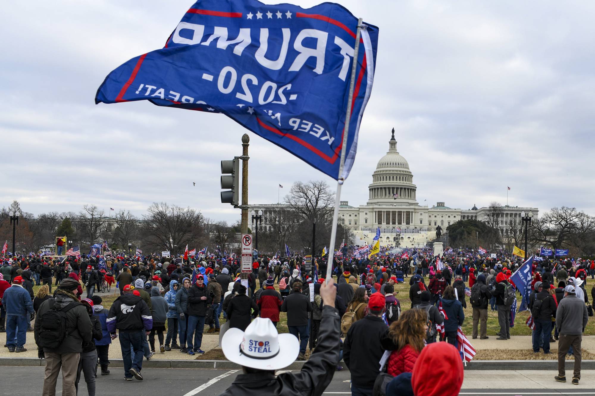 Supporters of U.S. President Donald Trump march to the Capitol in Washington after hearing him speak at a rally outside the White House on Jan. 6.  | KENNY HOLSTON / THE NEW YORK TIMES