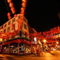 Lanterns sway in the wind in a quiet Chinatown in London in April 2020. | REUTERS