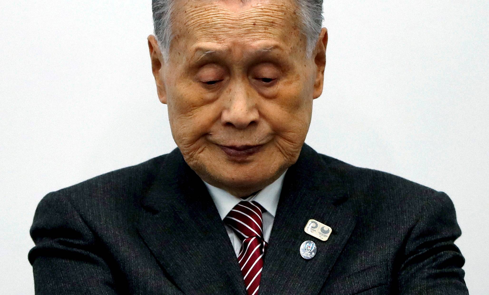 Yoshiro Mori, president of the Tokyo Organizing Committee of the Olympic and Paralympic Games, holds a news conference in Tokyo in March 2020. | REUTERS