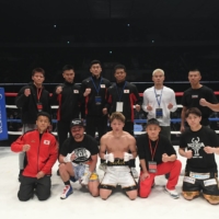 Participating fighters in Thursday\'s \"Legend\" exhibition pose for a group photo after the event at Yoyogi National Gymnasium. | COURTESY OF THE \"LEGEND\" EXECUTIVE COMMITTEE