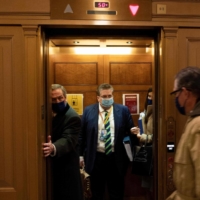 Defense lawyers Michael van der Veen and Bruce Castor Jr. (right) leave after the fourth day of former U.S. President Donald Trump\'s impeachment trial before the Senate on Capitol Hill in Washington on Friday. | AFP-JIJI