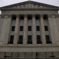 Lawyers for two men accused of helping Carlos Ghosn flee Japan have asked the U.S. Supreme Court to intervene and delay their extradition. | REUTERS