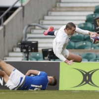 England\'s Jonny May scores his team\'s third try against Italy in Six Nations action on Saturday in London. | REUTERS