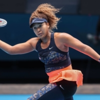 Naomi Osaka hits a return against Garbine Muguzura during their women\'s singles match in the Australian Open\'s round of 16 on Sunday in Melbourne. | AFP-JIJI