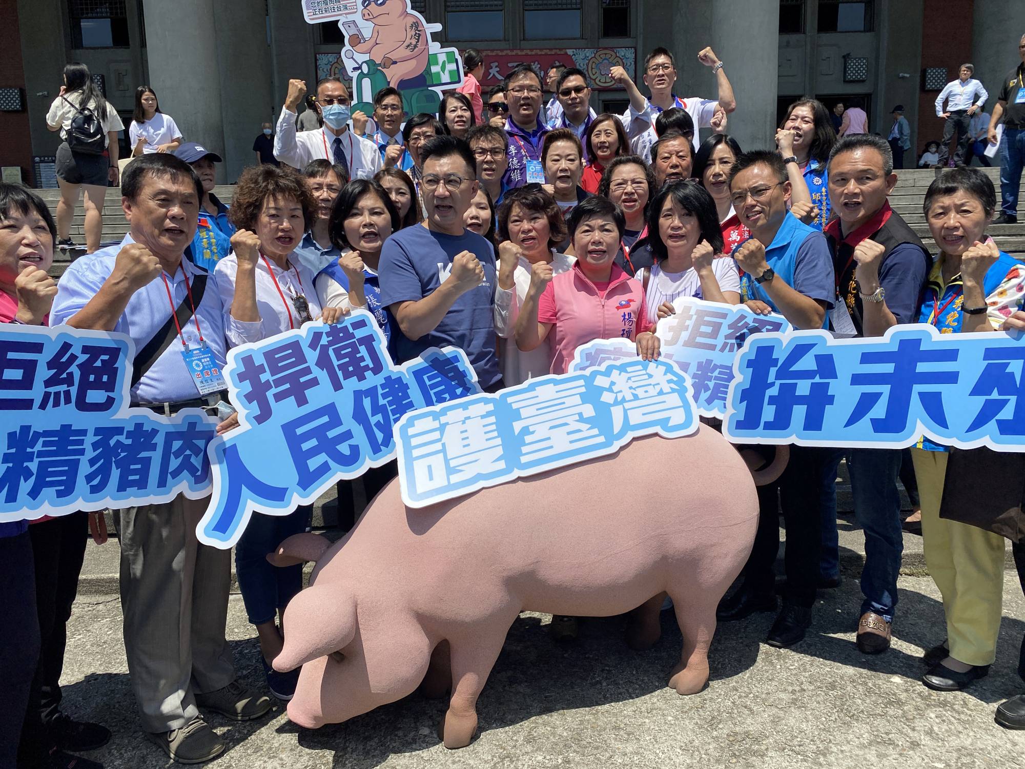 Kuomintang members demonstrate on the sidelines of a news conference calling to oppose U.S. meat imports, in Taipei last September. | REUTERS