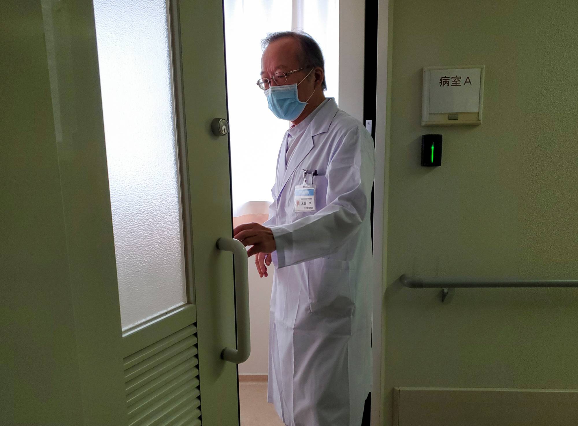 Manabu Yoneshima, manager of Municipal Tsuruga Hospital and Tokyo 2020 Olympic Games torch relay runner, says he feels torn between guilt and wanting to run.  | Reuters