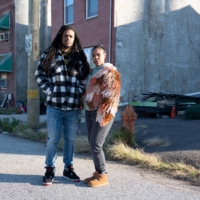 Abdul Muhammad, 34, and wife Marcella Muhammad, 31, in front of their house next to the PES Refinery in Philadelphia.  | REUTERS