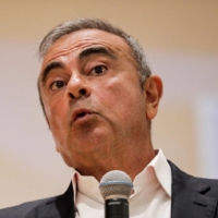 Two Americans charged with helping former Nissan chief Carlos Ghosn flee Japan have asked the U.S. State Department to halt their extradition to Japan. | AFP-JIJI
