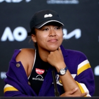 Naomi Osaka speaks at a news conference after winning her women\'s semi-final match against Serena Williams on Thursday. | AFP-JIJI