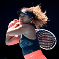 Naomi Osaka plays against Serena Williams in their semifinal match at Melbourne Park on Thursday. | REUTERS