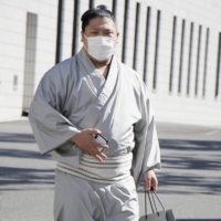 Maegashira Wakatakakage is seen after having a health checkup at Ryogoku Kokugikan on Friday. | KYODO